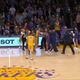Lonzo Ball rushing to head coach Luke Walton’s aid. Image via YouTube